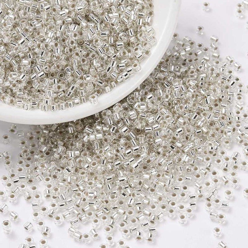 Seed beads, ca. 2x1,5 mm, lys sølv, ca. 5 gram