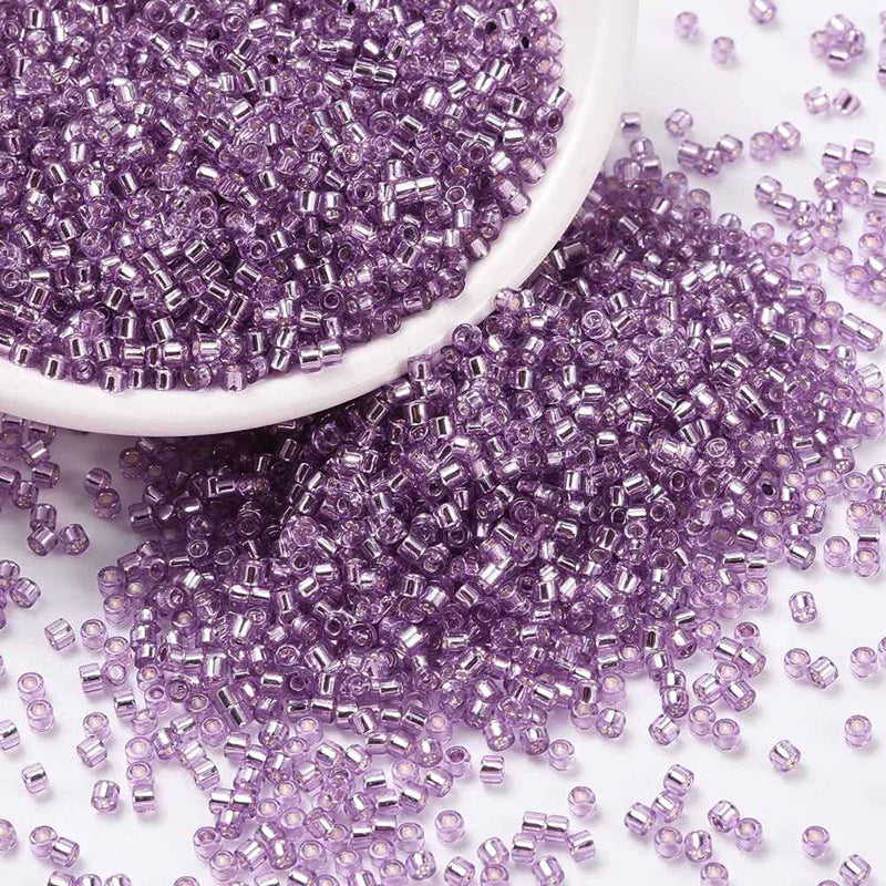 Seed beads, ca. 2x1,5 mm, violet, ca. 5 gram