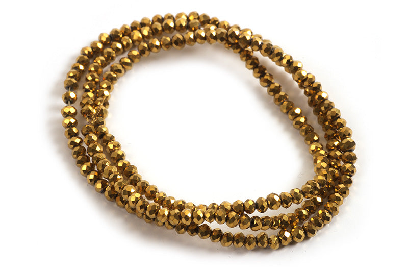 Glasperle, rondel, facet, guld, 3x2 mm, 1 streng