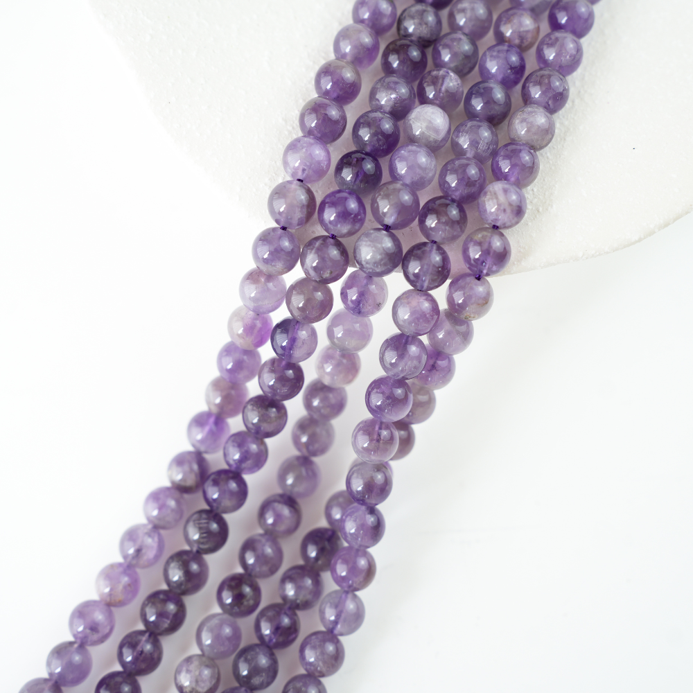 Lilla Krystal,10mm rund,hel streng 37cm