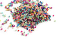 Seed beads, ca. 1,5-2x1-2 mm, multicolour, ca. 10 gram