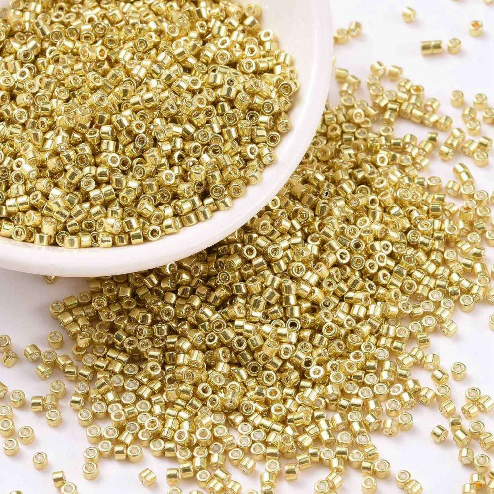 Seed beads, metallic guld, 2x1,5 mm. 10g