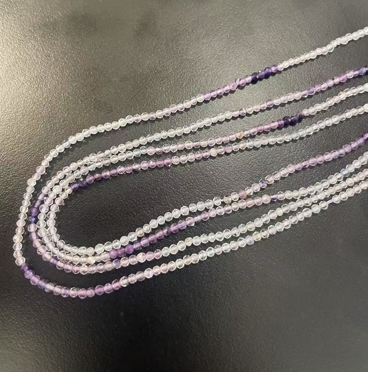 Amethyst , rund, ca. 2 mm, 1 streng