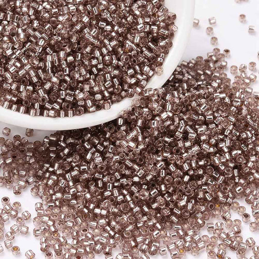 Seed beads, ca. 2x1,5 mm, mørk rosa, ca.10 gram