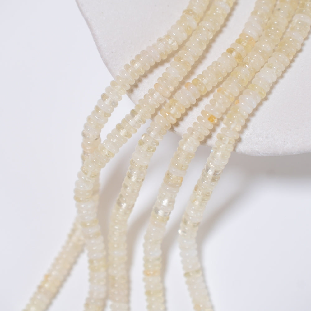Hvid Agat,2.5x6.5mm glatte rondeller, hel streng 39cm