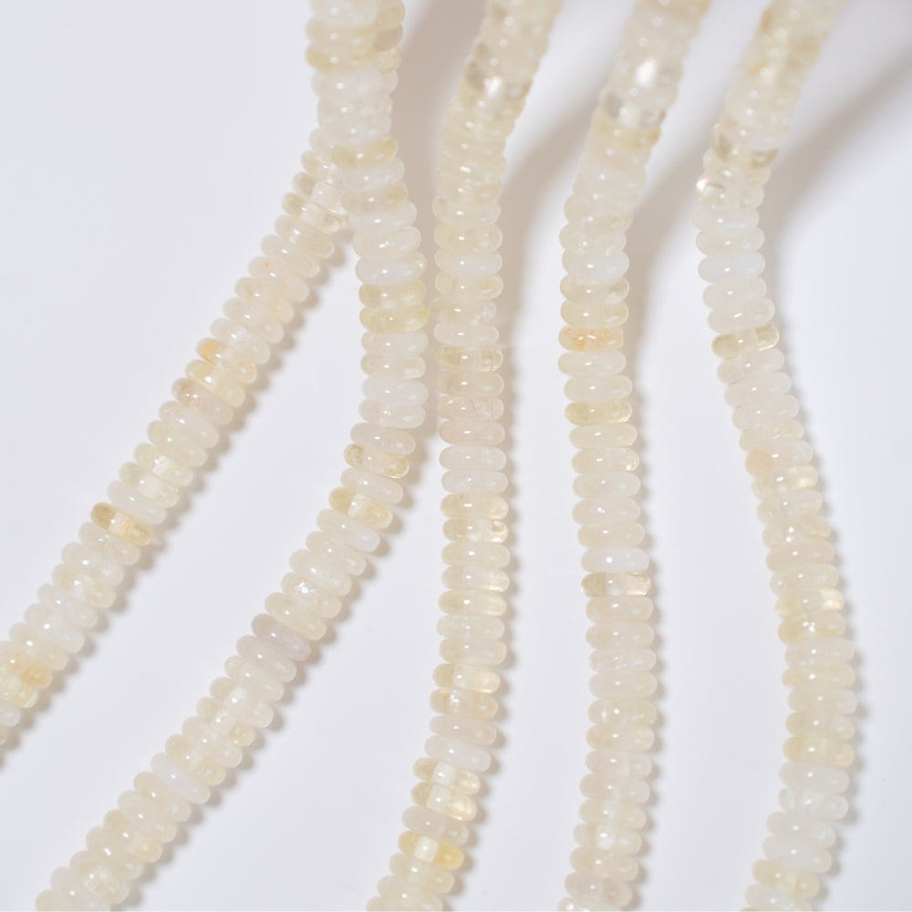 Hvid Agat,2.5x6.5mm glatte rondeller, hel streng 39cm