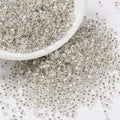 Seed beads, ca. 2x1,5 mm, lys sølv, ca. 5 gram