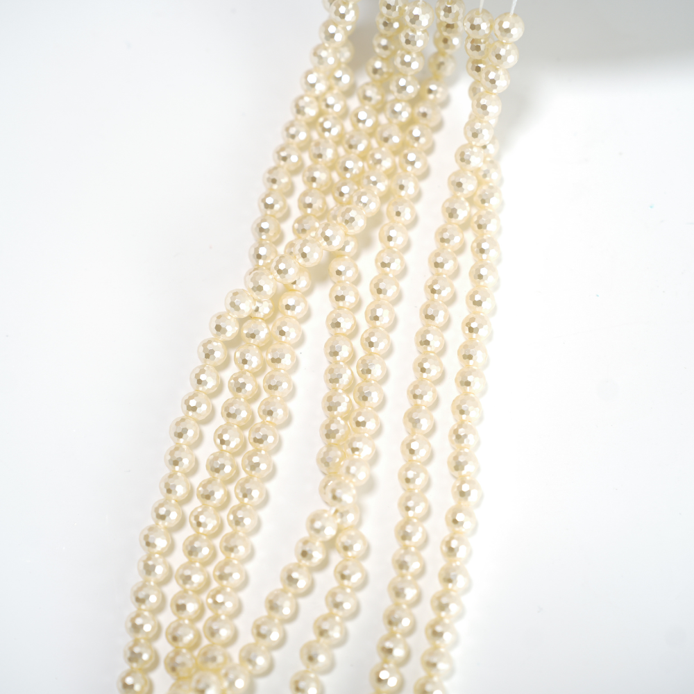 Crystal pearl,5.7mm diamantslebet rund/40cm, Hel Streng - Lysegylden