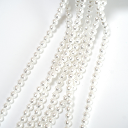 Crystal pearl,5.7mm diamantslebet rund/40cm, Hel Streng - Cream