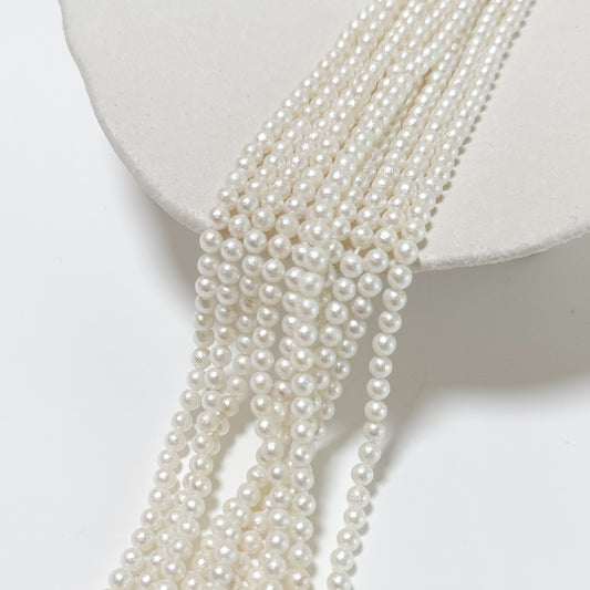 Crystal pearl,Bomuldstekstur/4.3mm rund/40cm, Hel Streng - Cream
