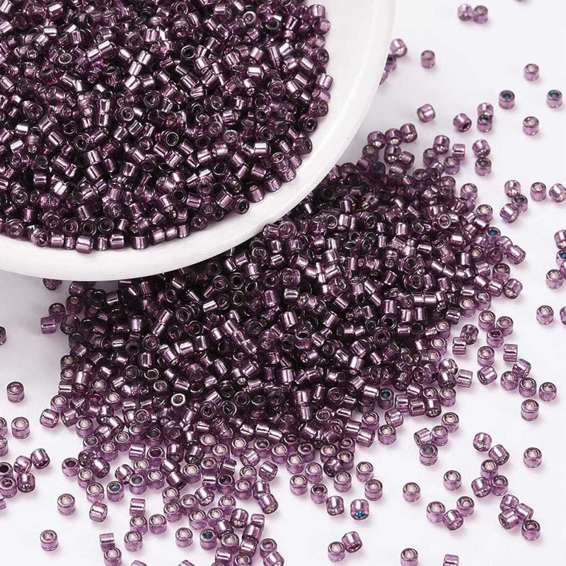 Seed beads, ca. 2x1,5 mm, violet, ca. 5 gram