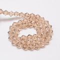 Krystal glasperle, bicones, champagne, 4x4, 1 streng