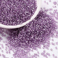 Seed beads, ca. 2x1,5 mm, violet, ca. 5 gram