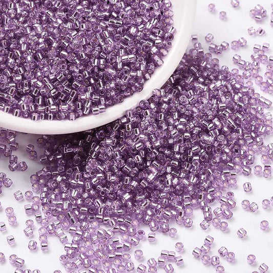 Seed beads, ca. 2x1,5 mm, violet, ca. 5 gram