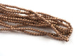 Hæmatit, rund, facet, kobberfarvet, 2 mm, 1 streng