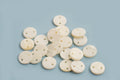 Shell pearls, mønt m/2 huller, ca.10x1,5 mm, hvid, 25 stk.