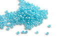 Seed beads, ca. 3 mm, lys turkis med shine, ca. 15 gram