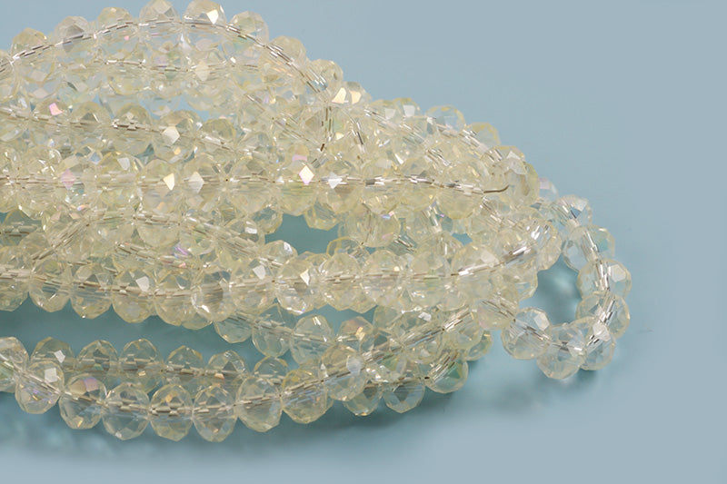 Glasperle, rondel, facet, klar, 5x6 mm, 1 streng