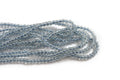 Glasperle, ca. 2,5 mm, lyseblå, 1 streng
