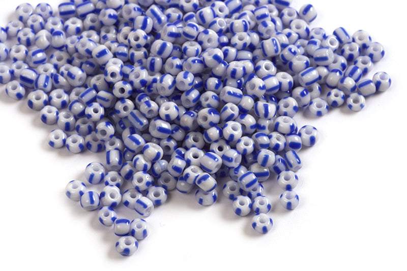 Seed beads, stribede, 8/0, ca. 3-3,5x2-2,5 mm, blån/hvid, ca. 15 gram