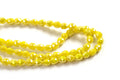 Glasperle, dråbe, facet, gul, 4,5x4,5 mm, 1 streng