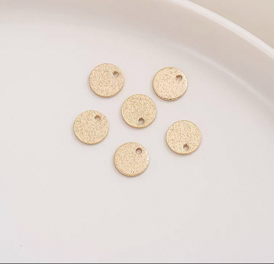 Mønt m/1 huller, børstet, 12x1 mm, FG, 4 stk.