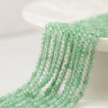 Natural Green Strawberry,Facetslebne Rondeller 2X4mm, Hel Streng
