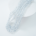 Zirkon,Diamantslebet Rund, 9.5*9.5mm/35cm，Hel Streng - Klar med blå nuance