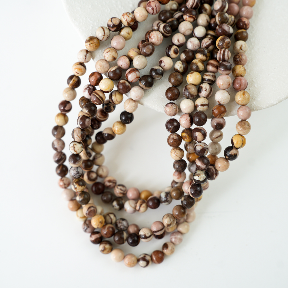 Australisk zebrasten，6mm rund，hel streng 38cm