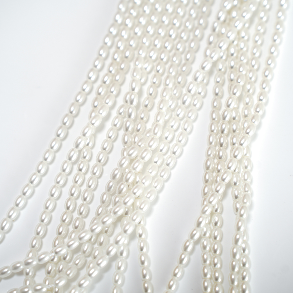 Crystal pearl,3*4mm risformet/40cm, Hel Streng - Cream