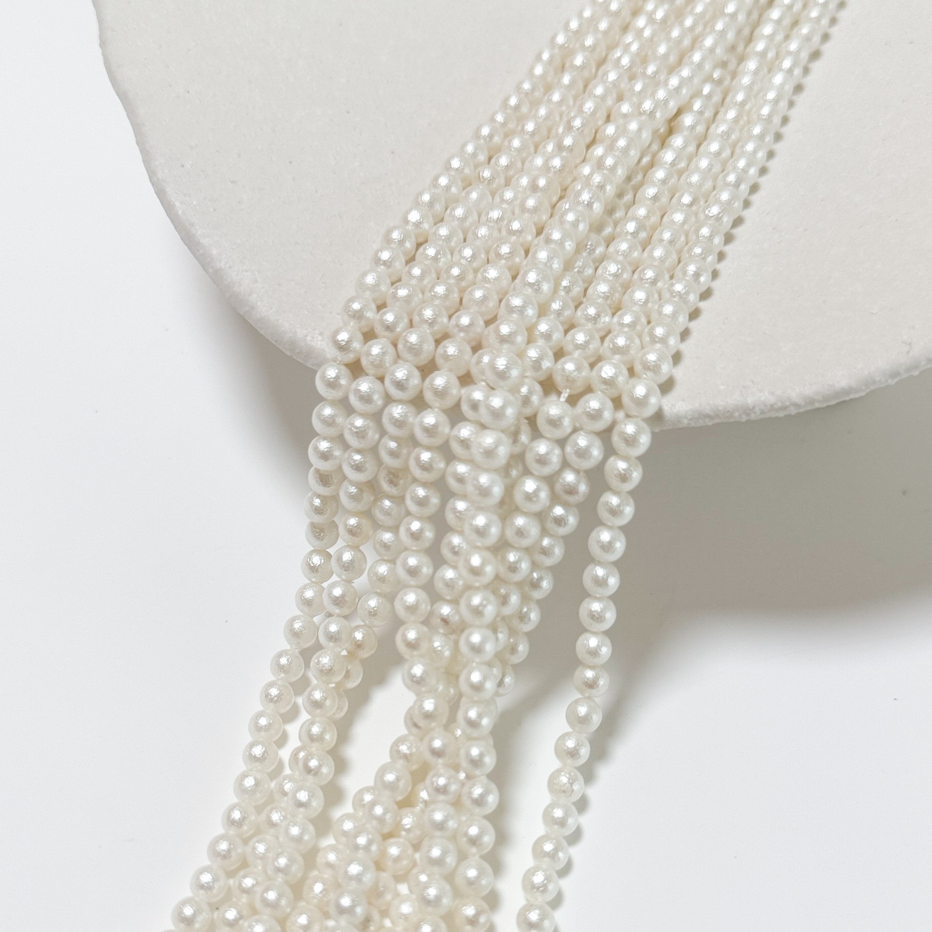 Crystal pearl,Bomuldstekstur/4.3mm rund/40cm, Hel Streng - Cream