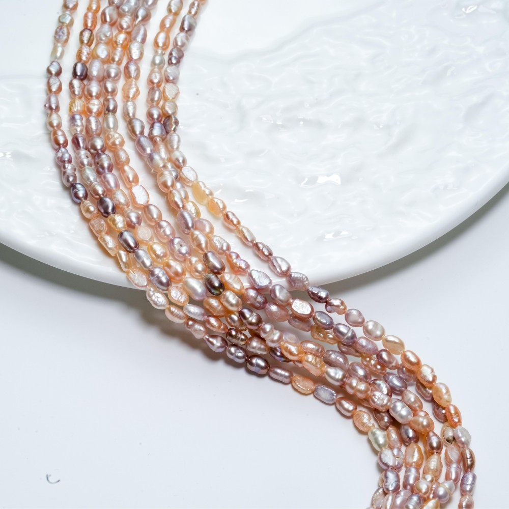 Ferskvandsperler,Barok ris, 4-5mm/35cm