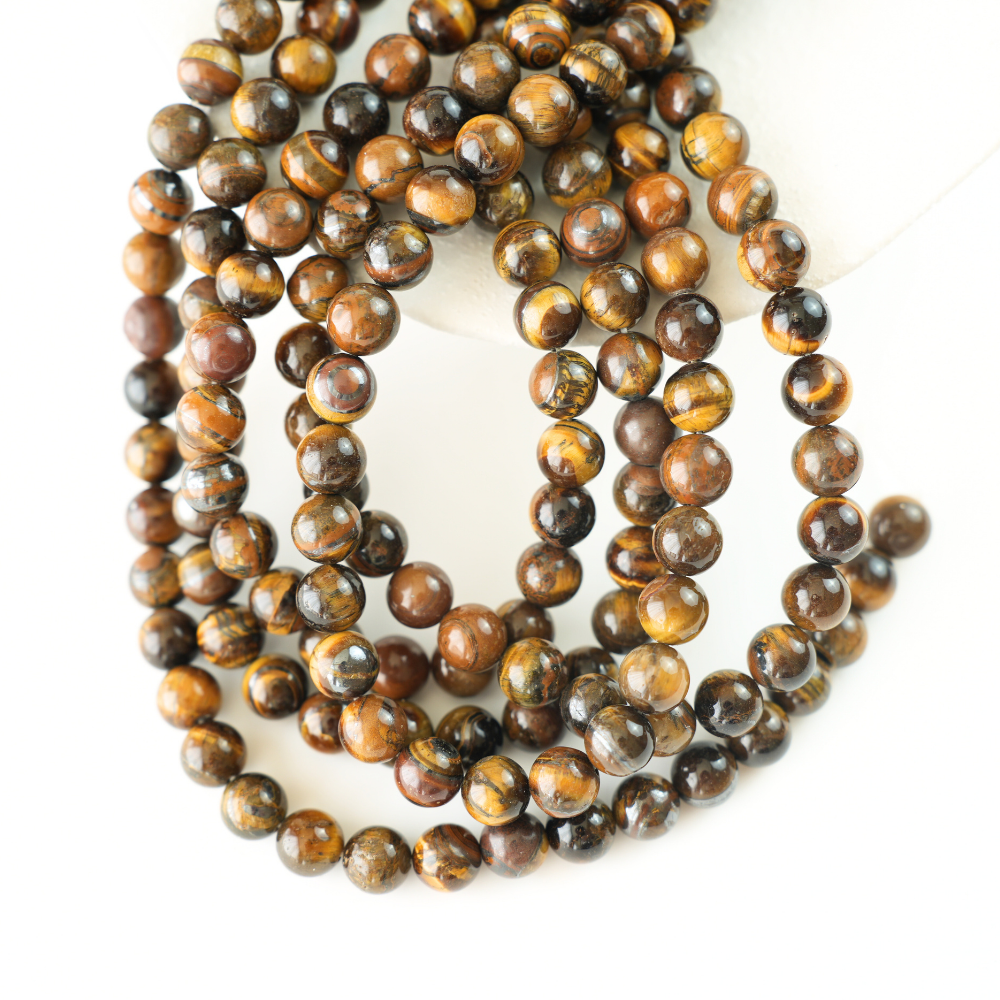 Gul Tigerøje，10mm rund，hel streng 38cm