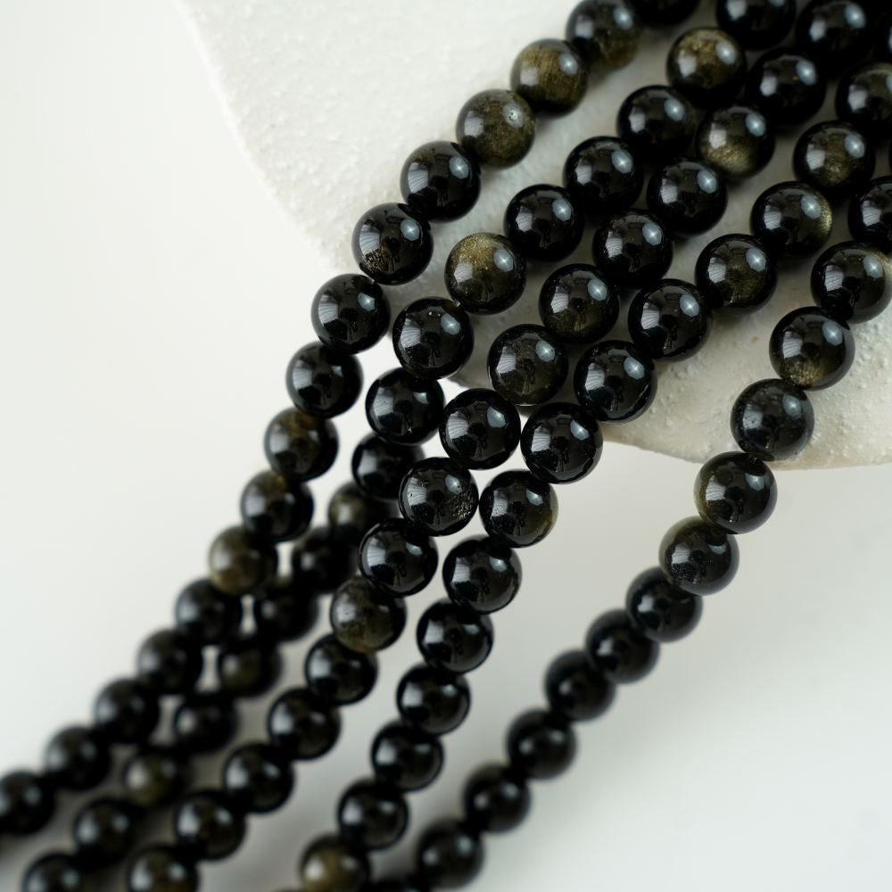 Guldobsidian，10mm rund，hel streng 38cm