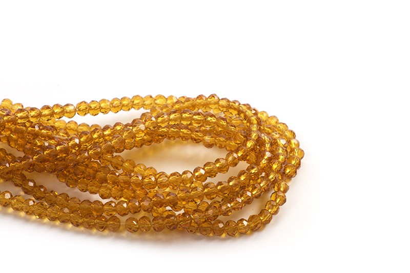 Glasperle, rondel, facet, honninggul, 3x2 mm, 1 streng