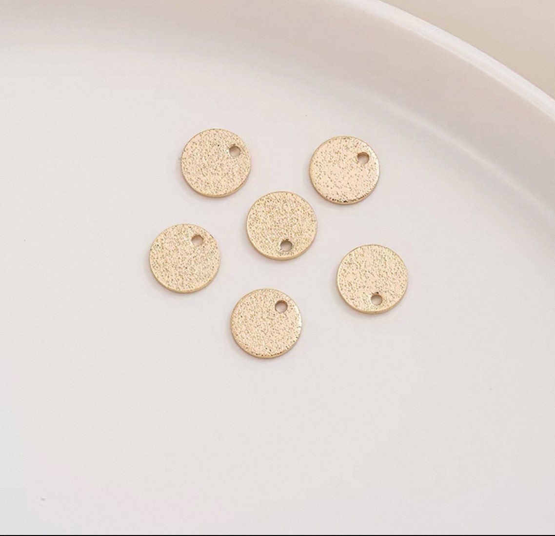 Mønt m/1 huller, børstet, 12x1 mm, FG, 4 stk.