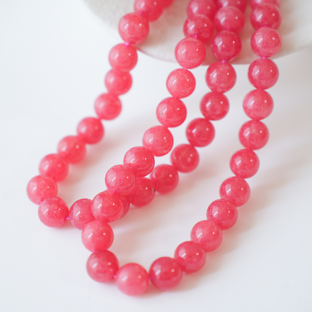 Rød Korund,10.5mm rund38cm,hel streng