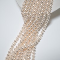 Crystal pearl,11.7mm rund/40cm, Hel Streng - Ivory