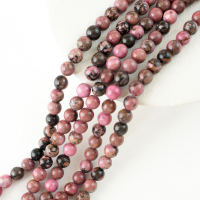 Rhodochrosit med sorte striber，10mm rund，hel streng 38cm
