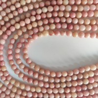 Rhodonite , rund 4 mm , hel streng